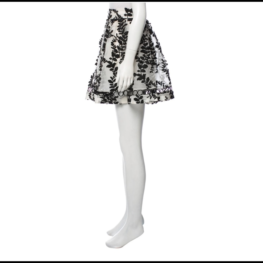 ZIMMERMANN
Silk Mini Skirt
Size: M
